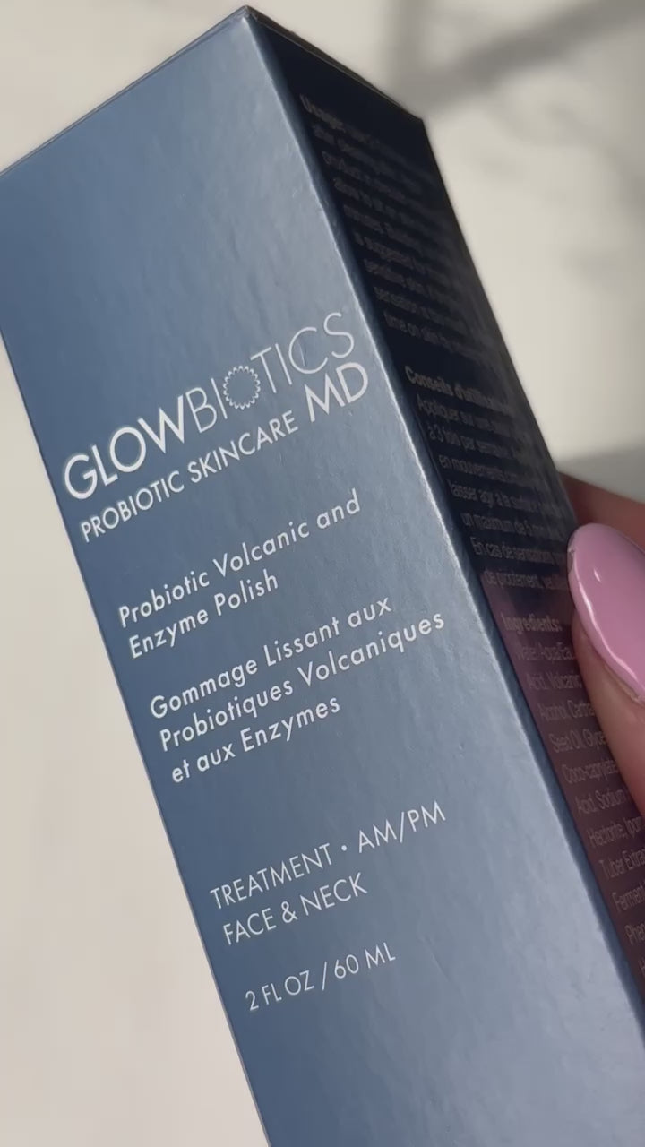 Video still of Glowbiotics Probiotic Volcanic and Enzyme Polish in its retail packaging with product tube partially visible