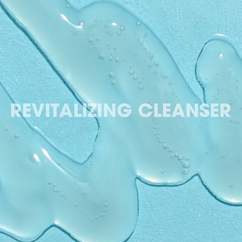 Glowbiotics Probiotic Revitalizing Cleanser gel texture on blue background with text “Revitalizing Cleanser”