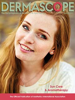 Dermascope magazine cover featuring red-haired model