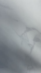 Product unboxing of Glowbiotics Probiotic Brightening + Refining Layering Solution, followed by application on the back of the hand using a pad