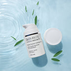 Glowbiotics Gentle Probiotic Calming Lotion jar and open lid floating on rippling water with green leaves